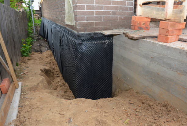 Happy homeowners after waterproofing job in Eldorado